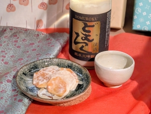 どむろく純米大吟醸と料理の画像